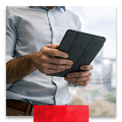 image of a man using a tablet